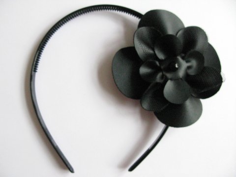 Sort blomst med sorte jade sten