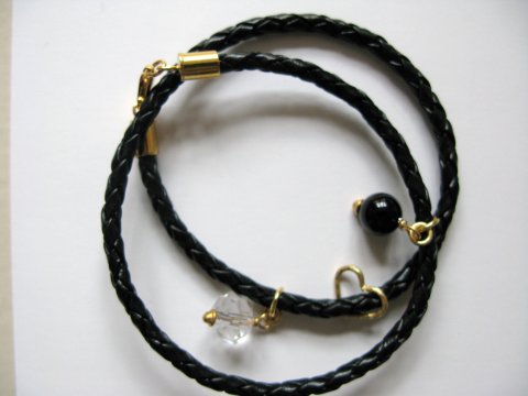 Flettet sort lderarmbnd