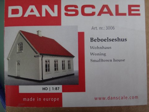 K�bstadshus, fire facadevinduer