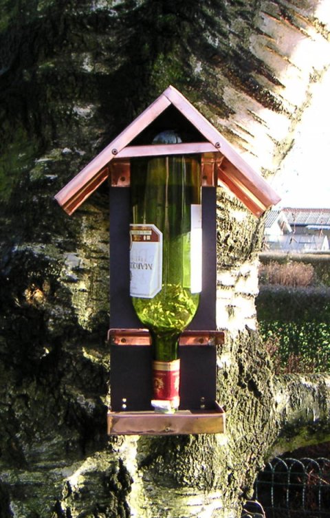 Foderautomat til flaske