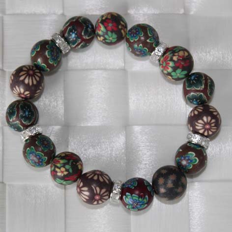 Fimo armbnd mrke brun med rihnstens perler