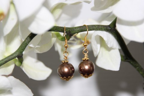 Kobberfarvet perle kr. 35,-