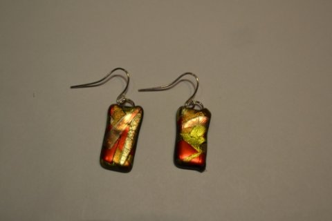 Hand crafted earrings in fp in gold, red and bronze