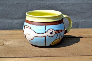 Mug with stork and baby