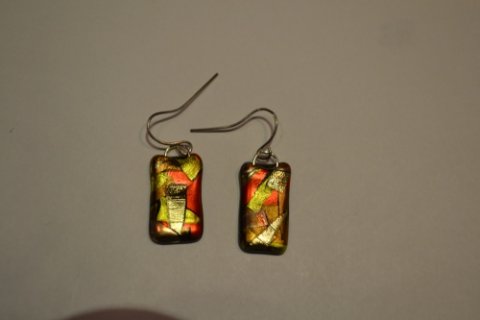 Hand crafted earrings in fp in gold, red and bronze