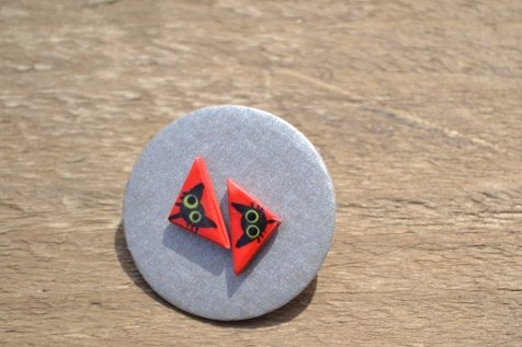 Red triangle with cats
