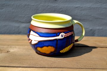 Mug with stork and baby