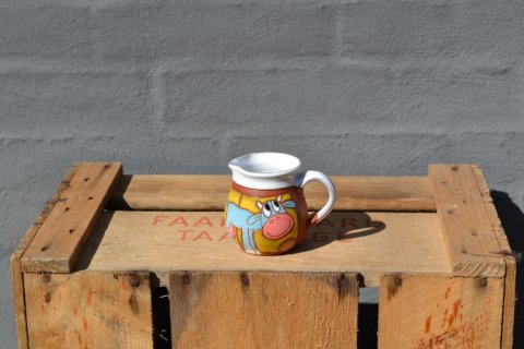 Milkjar with cow