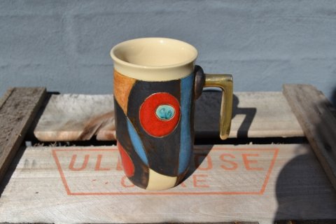 Mug with metalhandle
