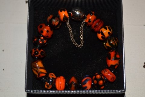 Bracelet in orange colours
