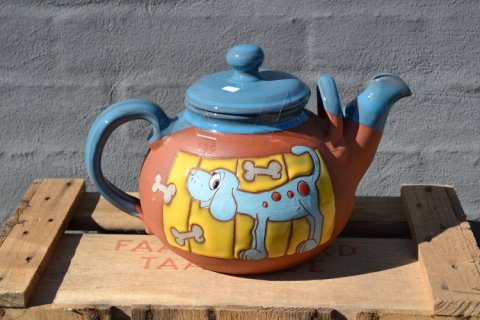 Teapot with dog
