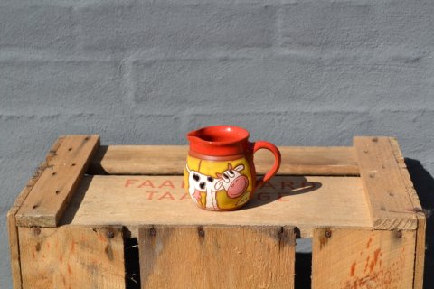 Milkjar with cow
