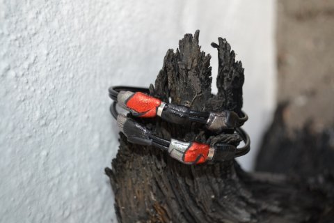 Handmade leatherbracelet in orange colours