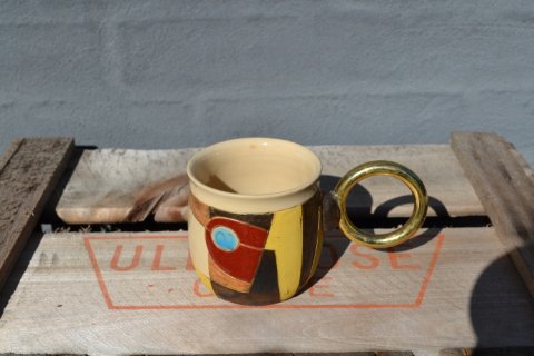 Mug with metalhandle