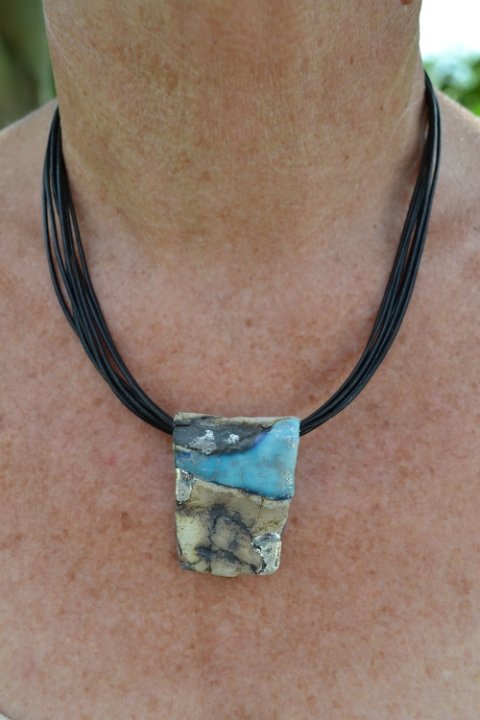 Leathercord with porcelain pendant