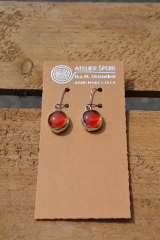 Earrings with orange glass