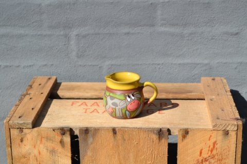 Milkjar with cow