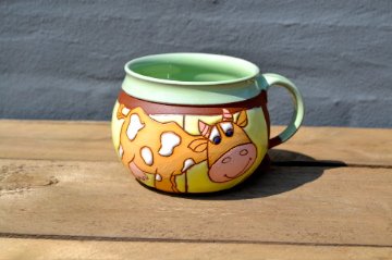 Mug with cow with spots