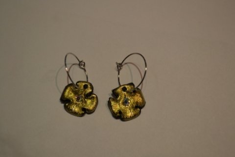 creol with flower in gold
