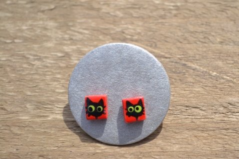 Red with black cats