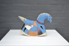 Bl/rd og brun hest