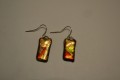 Hand crafted earrings in fp in gold, red and bronze