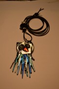 Necklace with an owl in silver and blue colours