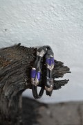 Handmade leatherbracelet in purple colours
