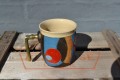 Mug with metalhandle