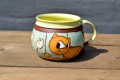 Mug with sitting cat