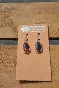 Earrings with orange, black and a blue stibe glass