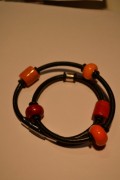 Leather bracelet with red and orange colours