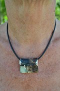 Single gauchuck cord with porcelain pendant