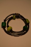Leather bracelet with beads and charms