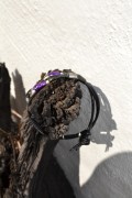 Handmade leatherbracelet with artificial material and locked with a knott