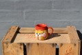 Milkjar with cow