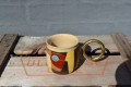 Mug with metalhandle