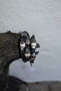 Handmade heavy leatherbracelet in silver and black colours