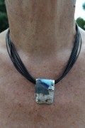 Leathercord with porcelain pendant