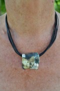 Leathercord with handmade porcelain pendant