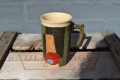 Mug with metalhandle