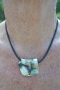 Single gauchuck cord with porcelain pendant