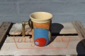 Mug with metalhandle