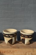 Both flowerpots with horses