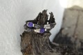 Handmade leatherbracelet in purple colours