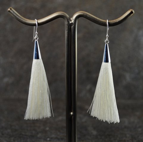 Rhvid tassel reringe