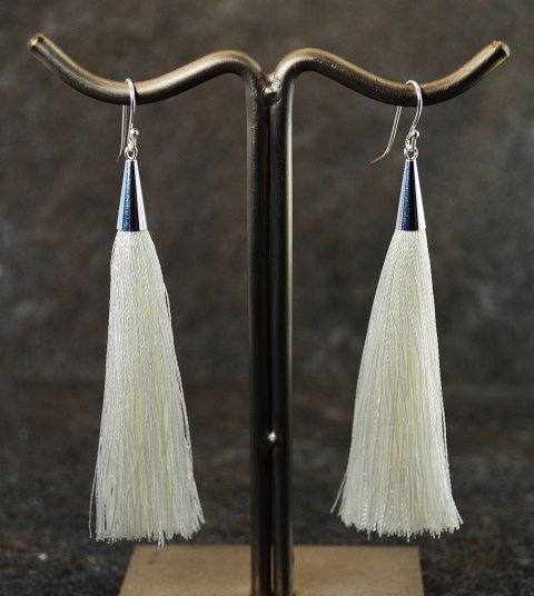 Rhvid tassel reringe