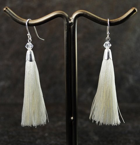 Rhvid tassel reringe