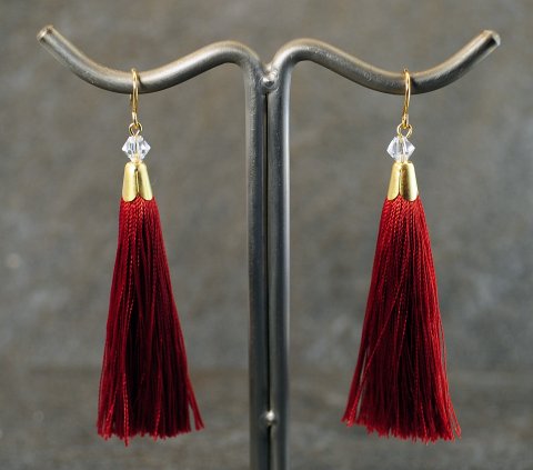 Maroon tassel reringe