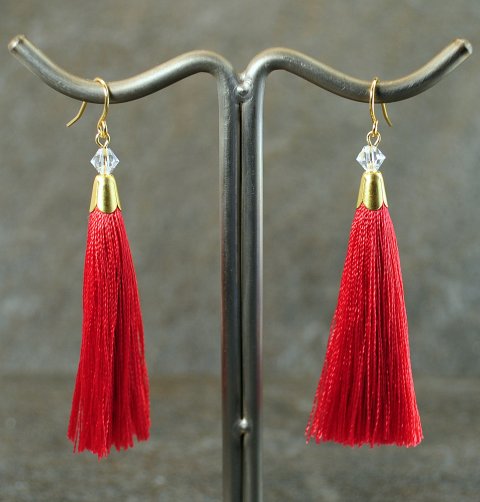 Mrk rd tassel reringe